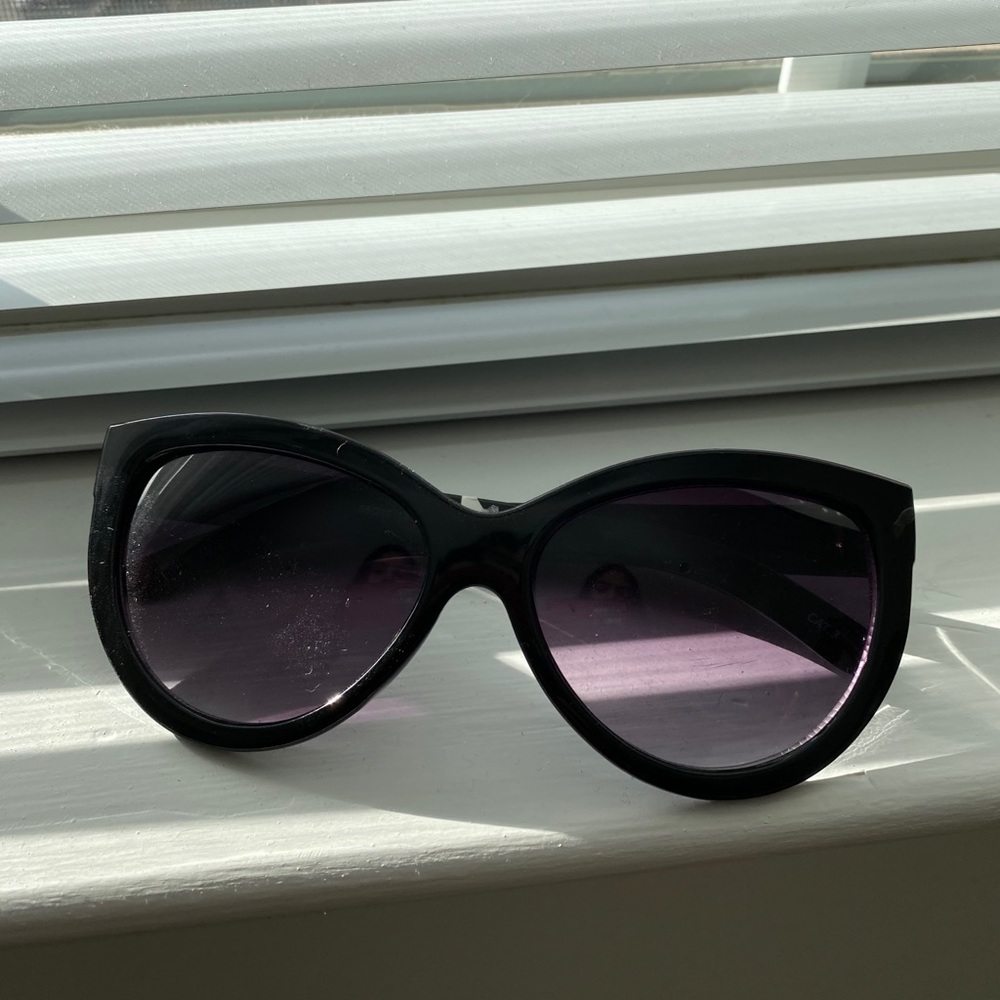 black framed wide shade sunglasses